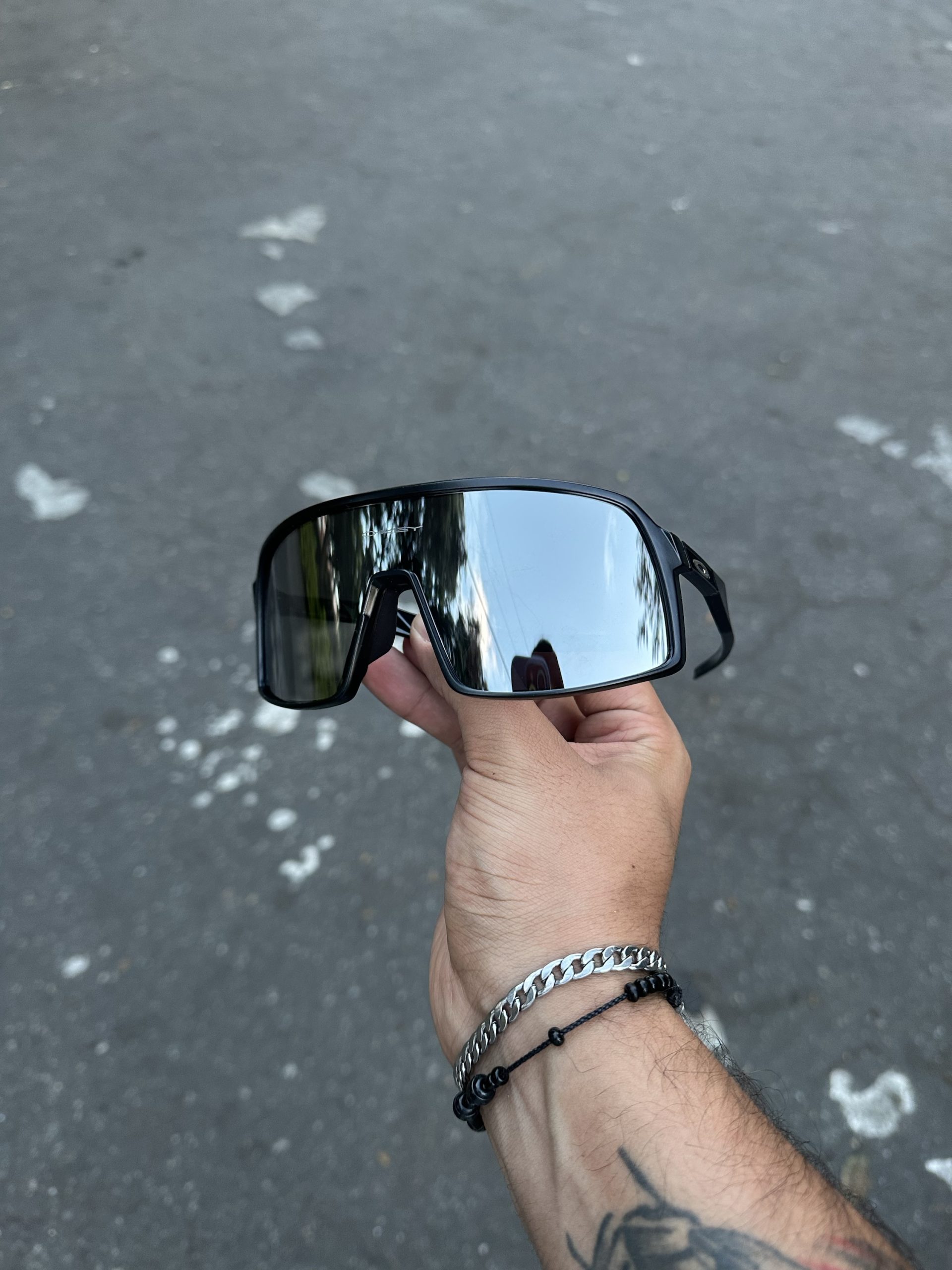9. OAKLEY BLACK SUTRO DARK MIRROR
